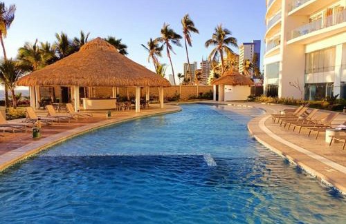 Zona Dorada Apartment | Apartment In Camino Al Mar with Amazing View of the Ocean, Beach and Swimming Pool