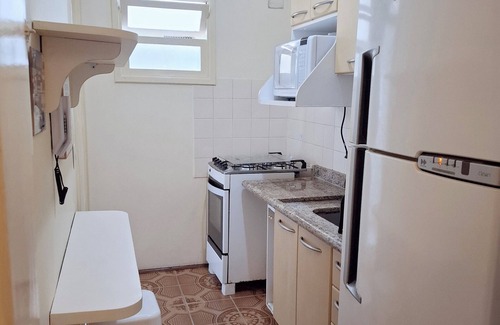 Vila Luis Antonio Apartment | Apartment in Guarujá, facing the sea, beach service, Wi-Fi, air conditioning, garage