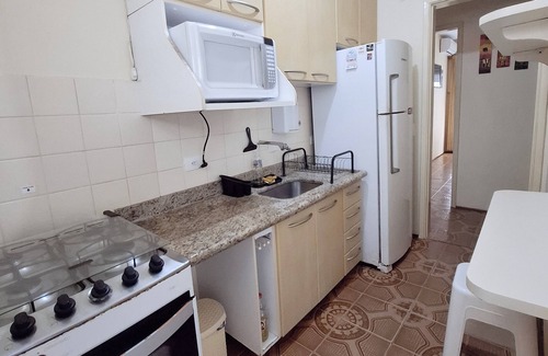 Vila Luis Antonio Apartment | Apartment in Guarujá, facing the sea, beach service, Wi-Fi, air conditioning, garage