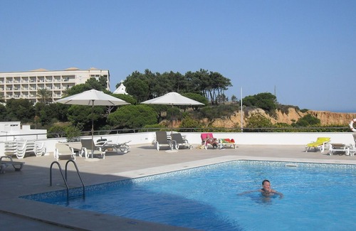 Olhos D'Agua Apartment | Apartment in Olhos de Água with Breathtaking Views Of The Private Pool & Beach