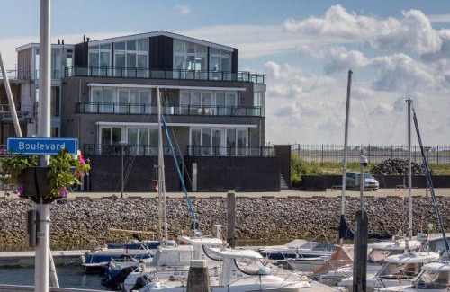 Sint-Annaland Apartment | Apartment in Sint-Annaland with Water Views