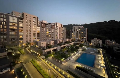 Duhur ash Shuwayr Apartment | Apartment in Tilal Fanar, Terrace, great for BBQ, pools, wifi,gym,parking,security