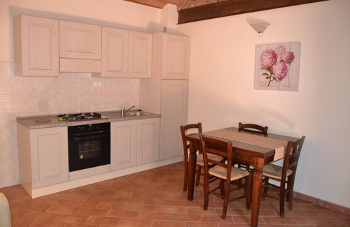 Casalappi Apartment | Apartment with balcony in medieval village with swimming pool, tennis, in the countryside near the sea and services