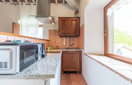Chianciano Terme Apartment | Apartment 'La Loggia' with Mountain View, Shared Pool and Wi-Fi
