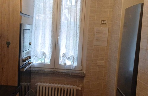 Laveno Apartment | Apartment 'La Meridiana Lago Maggiore 2' with Mountain View, Wi-Fi and Air Conditioning