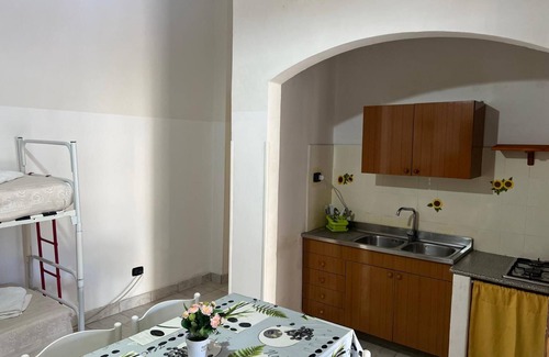 Palmi Apartment | Apartment 'La Quiete - Veranda Grande 1' with Shared Pool, Wi-Fi and Air Conditioning
