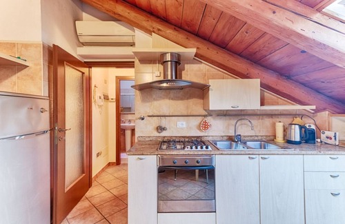 Barriera Vecchia-San Giacomo Apartment | Apartment located on the fifth floor of a building with a lift (there are 10 internal steps at the entrance to the apartment).In 45 sqm it comfortably accommodates 3 people, with a bedroom with two single beds and a sofa bed.Convenientlyt location and eq