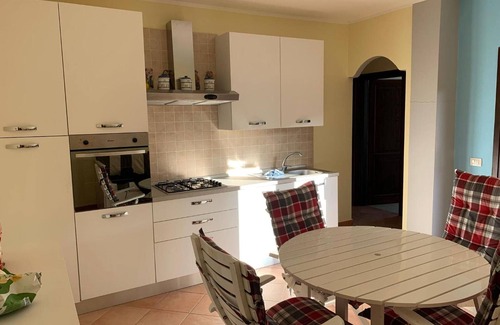 Monte Petrosu House | Apartment 'Prestige Exclusive' with Shared Pool, Wi-Fi and Air Conditioning