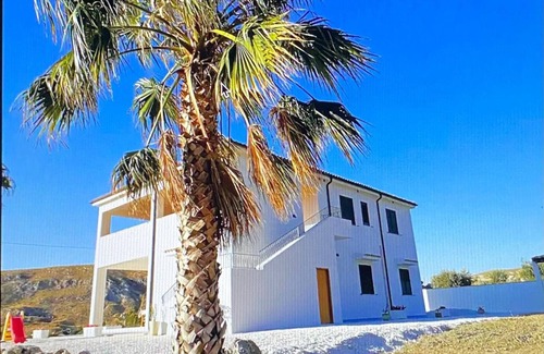 Montallegro Apartment | Apartment 'Quadrone Torre Salsa' with Sea View, Shared Terrace and Air Conditioning