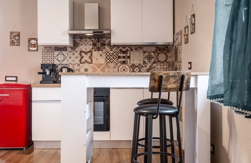 Pitigliano Apartment | Apartment 'Quercia' with Shared Garden and Air Conditioning