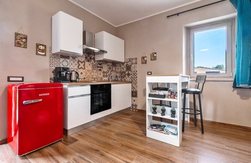 Pitigliano Apartment | Apartment 'Quercia' with Shared Garden and Air Conditioning