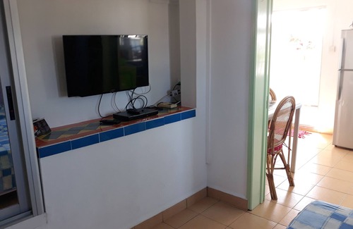 Pereybere Apartment | Apartment T1 (studio) with terrace, about 300 m from the beach of Pereybère.