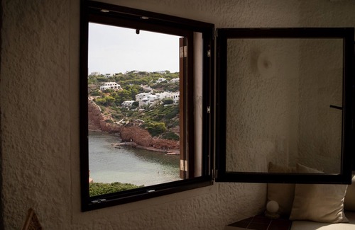 Ciutadella de Menorca Apartment | Apartment 'Unique Seafront Property' with Sea View, Wi-Fi and Air Conditioning