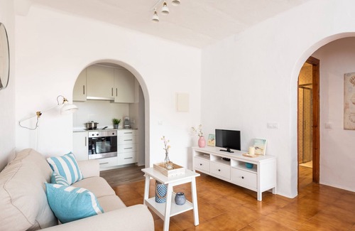 Platges de Fornells Apartment | Apartment 'Vistafaro' with Sea View, Shared Pool and Wi-Fi