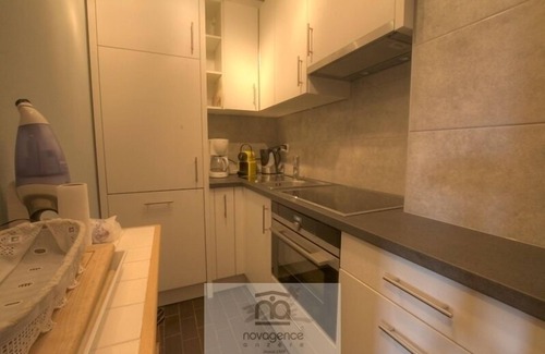 Anzere Apartment | Apartment with entrance corridor, bathroom/WC, bedroom with 2 single beds. Living room with chimney
