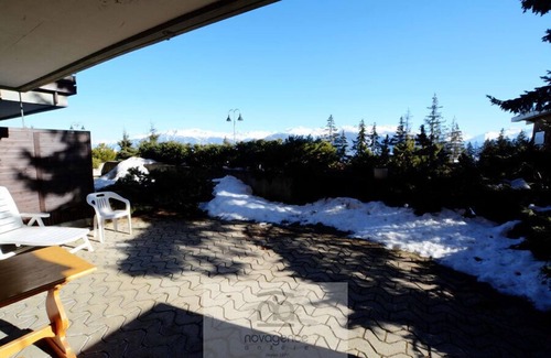 Anzere Apartment | Apartment with entrance corridor, bathroom/WC, bedroom with 2 single beds. Living room with chimney