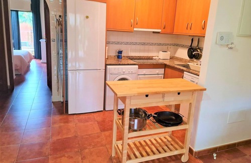 Los Puertos Condo | Apartment with large garden and air conditioning
