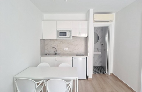 Corralejo Apartment | Apartment with terrace, swimming pool and beachfront in Corralejo - Home For Guest