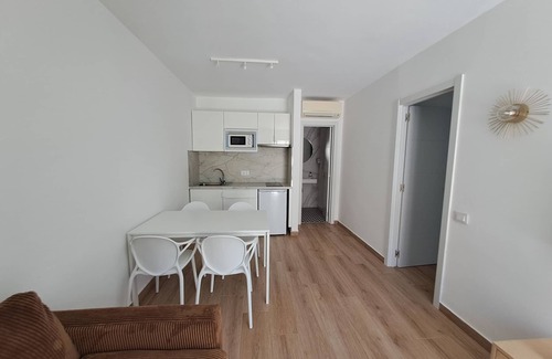 Corralejo Apartment | Apartment with terrace, swimming pool and beachfront in Corralejo - Home For Guest