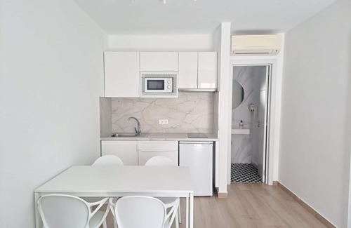 Corralejo Apartment | Apartment with terrace, swimming pool and beachfront in Corralejo - Home For Guest