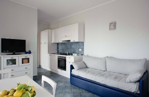 Villammare Apartment | Apartment with terrace. Shared pool. 150 metres from beach