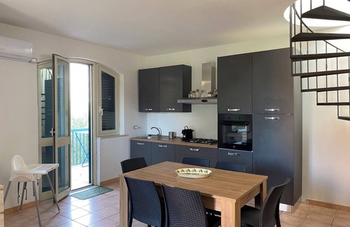 Eastern Sicily Apartment | Apartment with terrace overlooking crystal clear sea. Parking space. Pets allowed