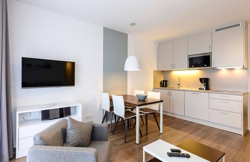 Bensersiel Apartment | Apartment with two balconies incl. use of swimming pool & sauna near the beach -