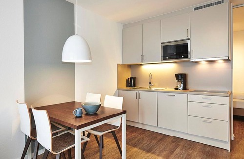 Bensersiel Apartment | Apartment with two balconies incl. use of swimming pool & sauna near the beach -
