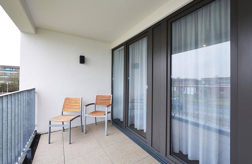 Bensersiel Apartment | Apartment with two balconies incl. use of swimming pool & sauna near the beach -