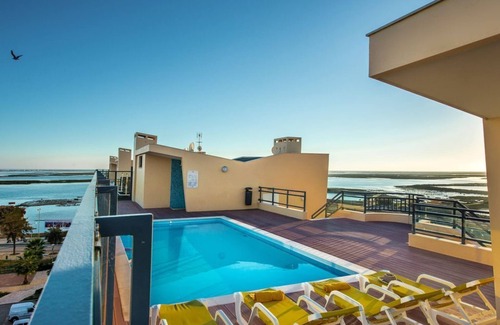 Olhao Apartment | Apartment with unique views of the salt flats and the sea in Olhao, Algarve
