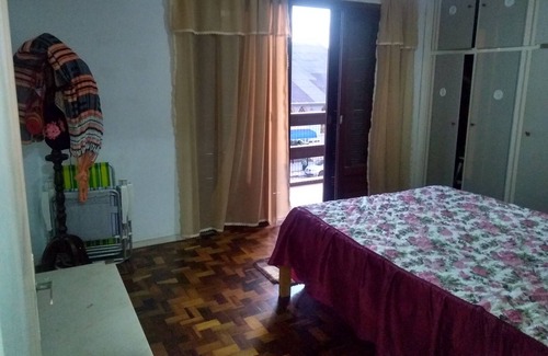 Tramandai Apartment | Apt Av da Igreja, wide in excellent location between the boardwalk and the sea