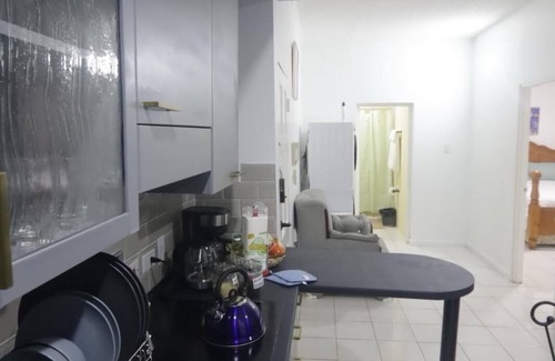 Barbican Apartment | Apt. In gated community near Bob Marley Museum with a pool