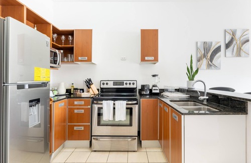 Santa Ana Apartment | Apt Orquidea in Santa Ana! AC, Wifi, Pool and Gym