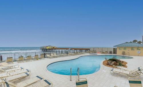 Daytona Beach Shores Apartment | Aquamarine Suite at Sunglow Resort by Brightwild