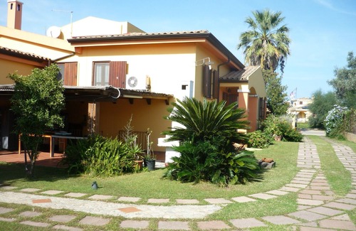 Arbatax Villa | arbatax tortoli: elegant and prestigious villa with green lawn and flowers