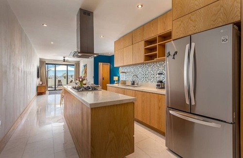 Cabo Bello Apartment | Arch views, Infinity Pool, Cozy, Close to Beaches
