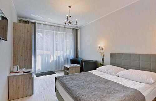 Miedzywodzie House | Arka - pokoje z osobnymi wejściami na parterze