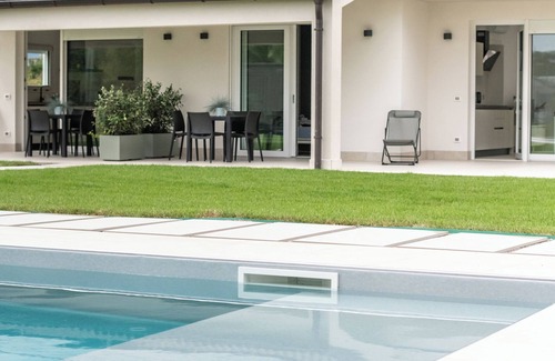 Borgo Milano Apartment | Armonia Suites Terra, new apartment with garden and pool in Verona