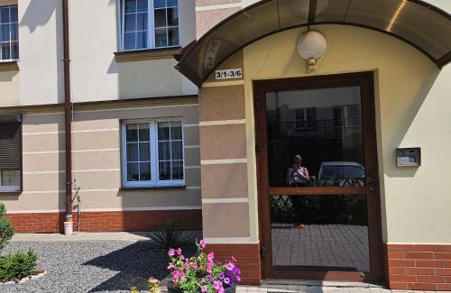 Ilawa Apartment | Artystyczna przestrzeń z widokiem na jeziora