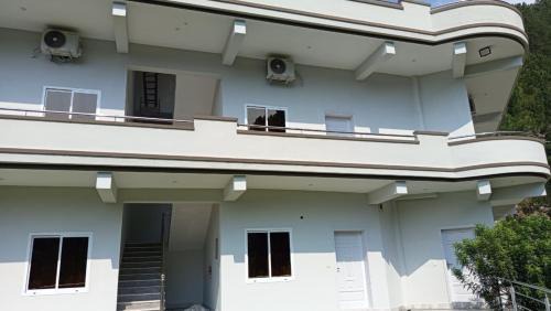 Mingora Apartment | At Home