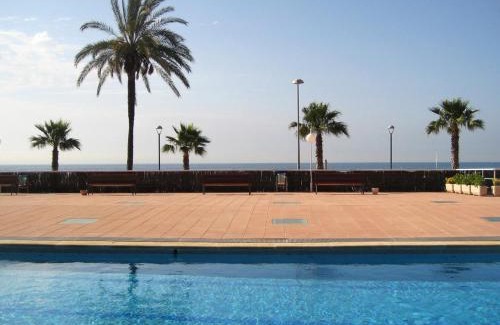 Torredembarra Apartment | AT116 Els Pins, comunidad con piscina en 1ra línea de la playa