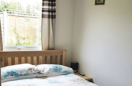 Bacton Ski Chalet | 'ATARDECER' - Modern two-bedroomed chalet located on Rainbows End Park, Bacton.