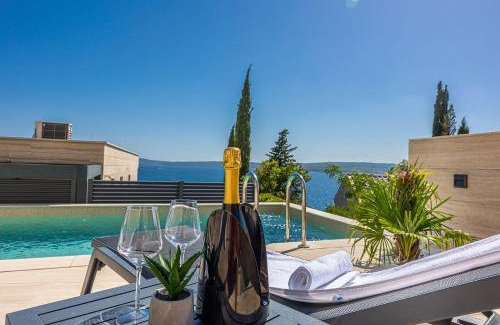 Selce Apartment | Atemberaubendes Apartment direkt am Meer mit Pool, Meerblick, Aussendusche, Liegen