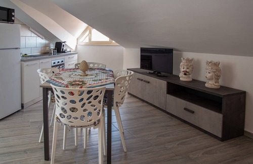 Aci Sant'Antonio Apartment | Attic room is unique and cozy in the center of the village.