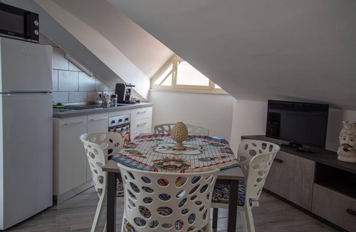 Aci Sant'Antonio Apartment | Attic room is unique and cozy in the center of the village.