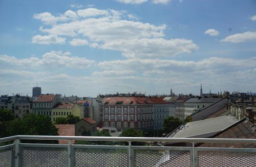Brigittenau Apartment | Augartenblick Penthauscombo 14/15 - Blick zum Riesenrad