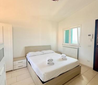 Focene Apartment | Azure Oasis with parking near the airport & beach