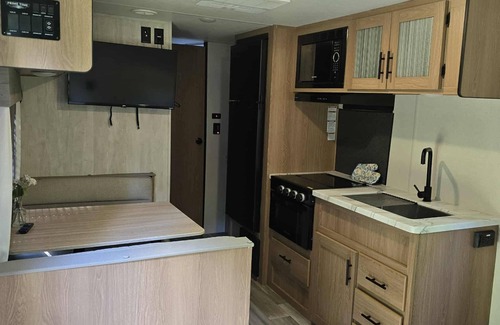 Carbon Hill RV Rental | Back road camper in New Straitsville on monday creek and by old mans cave.