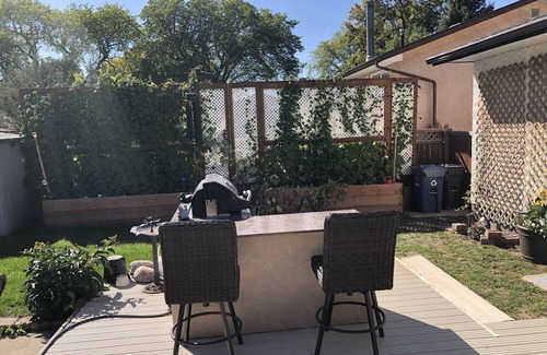 St. Vital House | Backyard oasis awaits. Enjoy your stay.