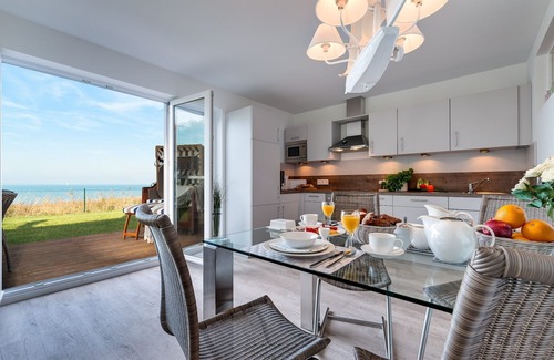 Olpenitz Apartment | Baltic Sea vacation apartment "Schleiperle" - with water view, sauna and two terraces